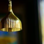 Photo dimmable brushed brass pendant light